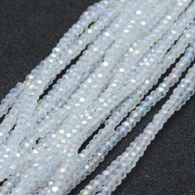 R1351 glaspärla fasett rondell 2,9~3,3x2 mm trans ab