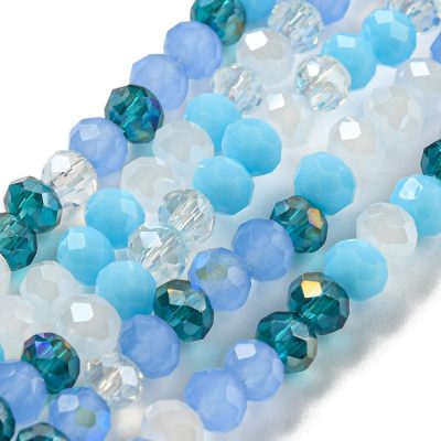 P167 Glaspärla fasett rondell, 4x3mm ljus himmelsblå mix