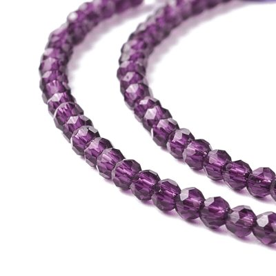P148 Glaspärla transparent fasett, rund 2mm violettröd