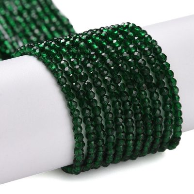 P09 dark green fasetterad glaspärla, rund 2mm