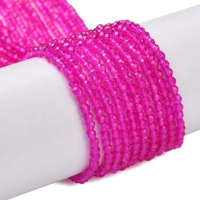 P07 magenta fasetterad glaspärla, rund 2mm