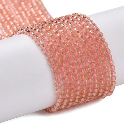 P08 light salmon fasetterad glaspärla, rund 2mm