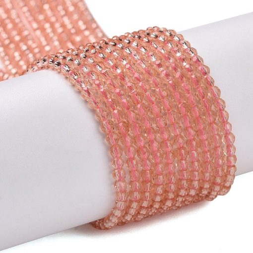 P08 light salmon fasetterad glaspärla, rund 2mm