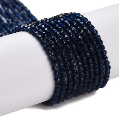 P34 prussian blue fasetterad glaspärla, rund 2mm