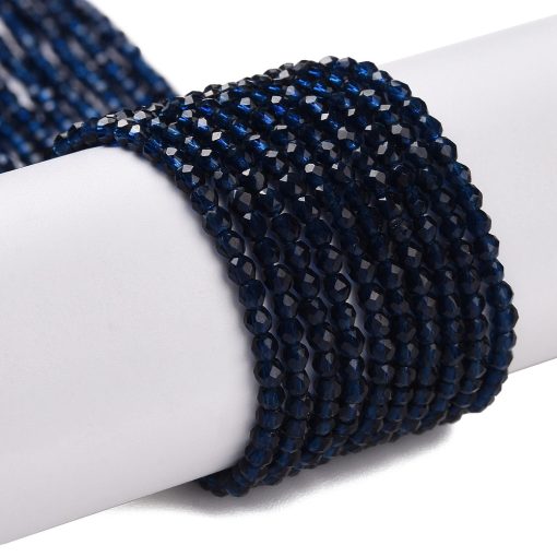 P34 prussian blue fasetterad glaspärla, rund 2mm