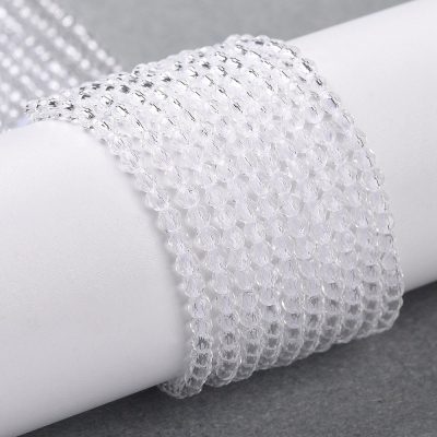 P01 transparent fasetterad glaspärla, rund 2mm
