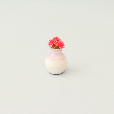 M06 miniatyr blomma i vas 33x22mm